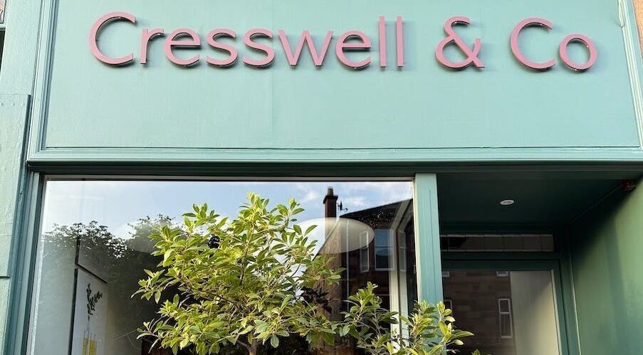 Cresswell Studios storefront with greenery in Glasgow, Scotland, GB, showcasing beauty and wellness.
