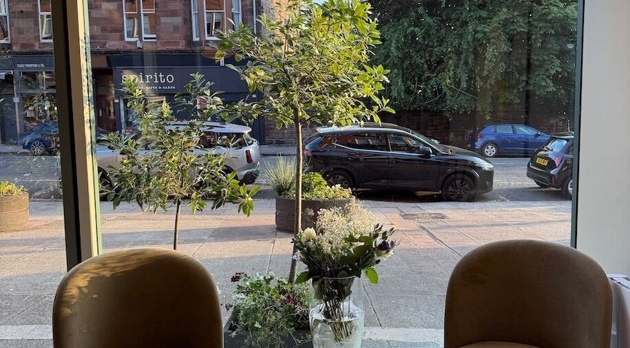Relaxing view from Cresswell Studios, Glasgow, Scotland, GB featuring trees and street scene.