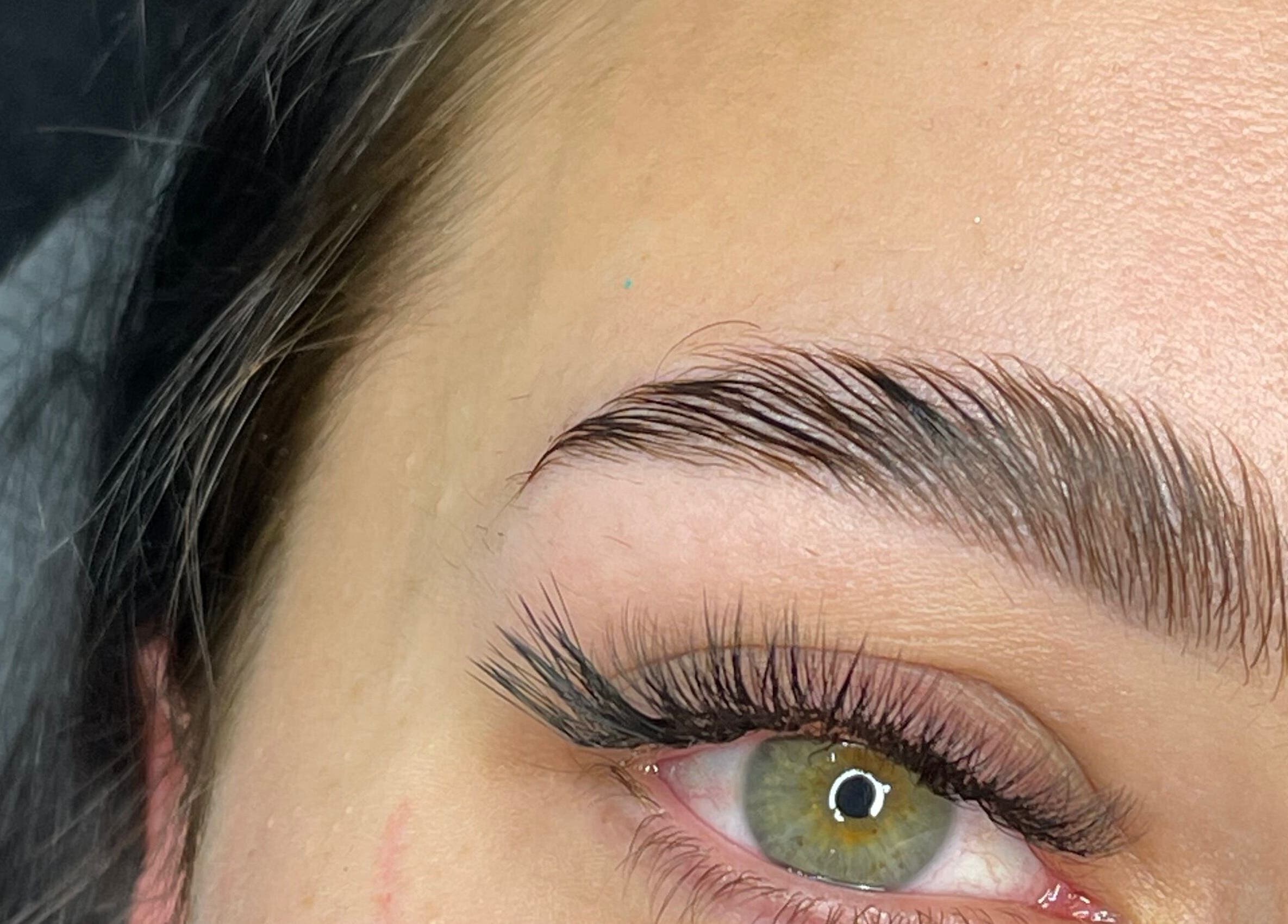 Close-up of beautifully groomed eyebrow and lashes at Lash La Drina, Bromley, England, GB.