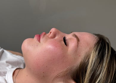 Client relaxing at Paradox Aesthetics, Worcester, England. Experience rejuvenation and inner peace.