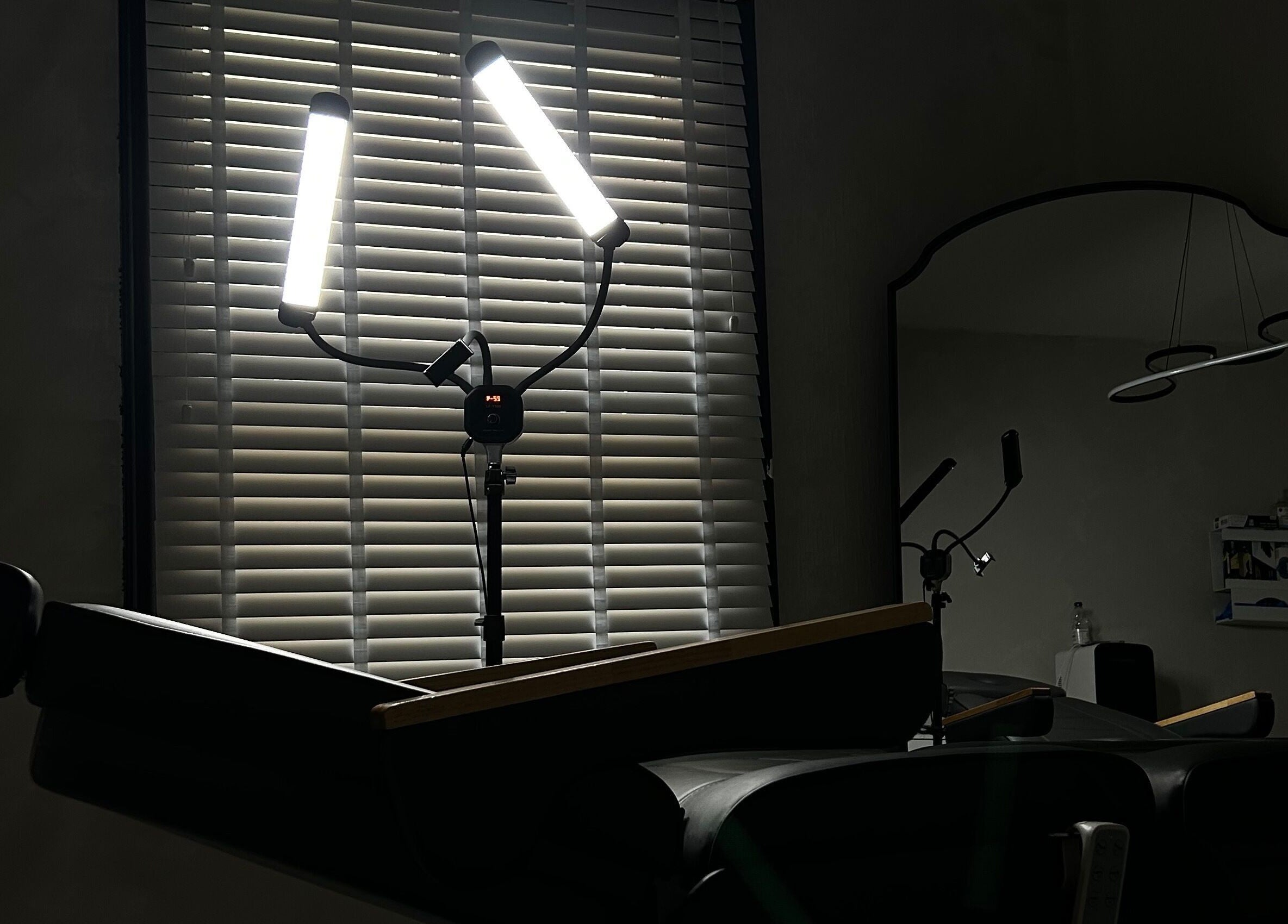 Treatment room at Paradox Aesthetics, Worcester, England with soft lighting and reclining chair.
