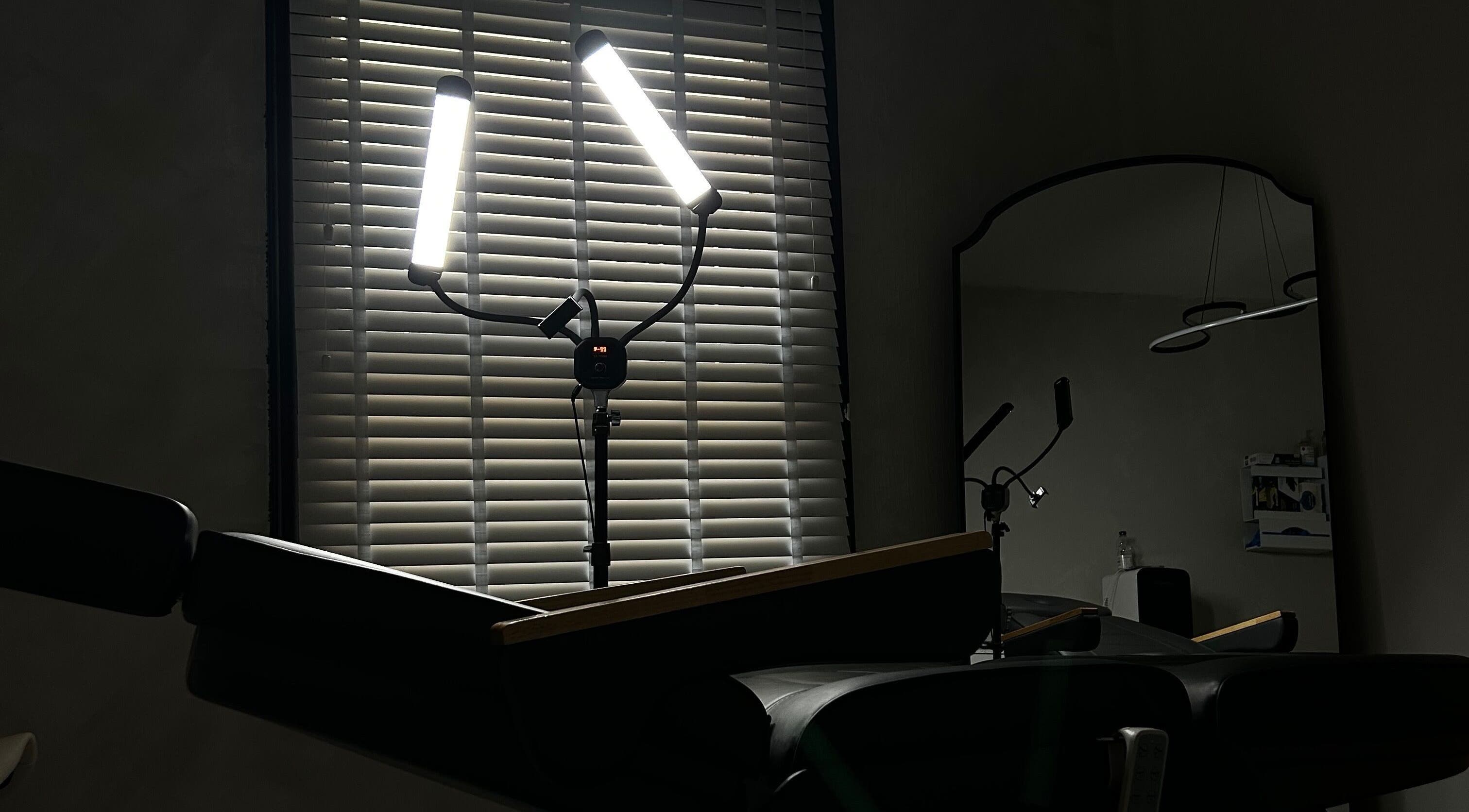 Treatment room at Paradox Aesthetics, Worcester, England with soft lighting and reclining chair.