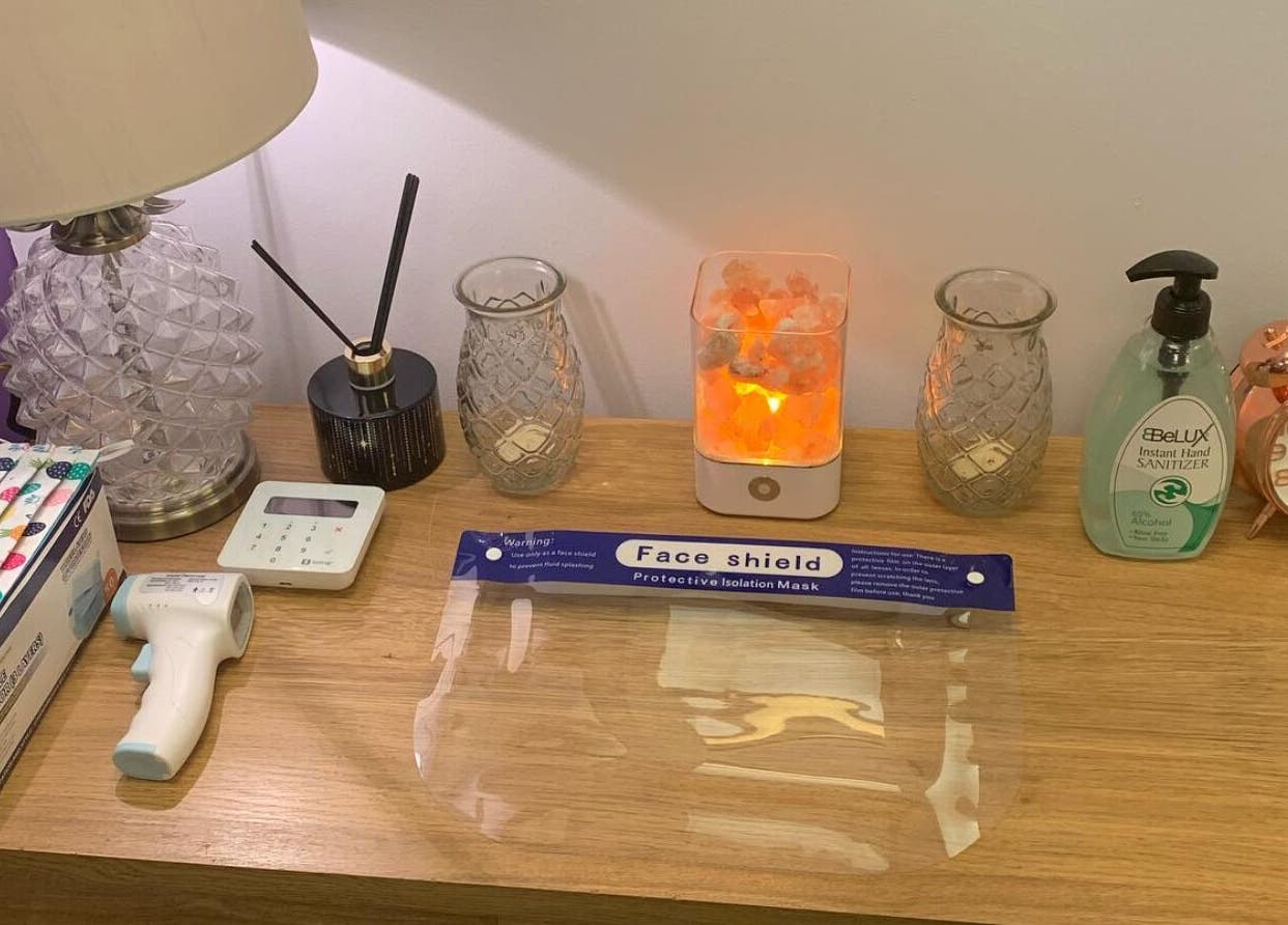 Cozy setup at Molly Sports Massage at Locker 27, Addlestone, England, with sanitized wellness essentials.