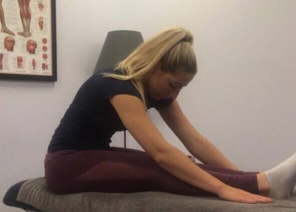 Person doing stretches at Molly Sports Massage at Locker 27, Addlestone, England, GB.