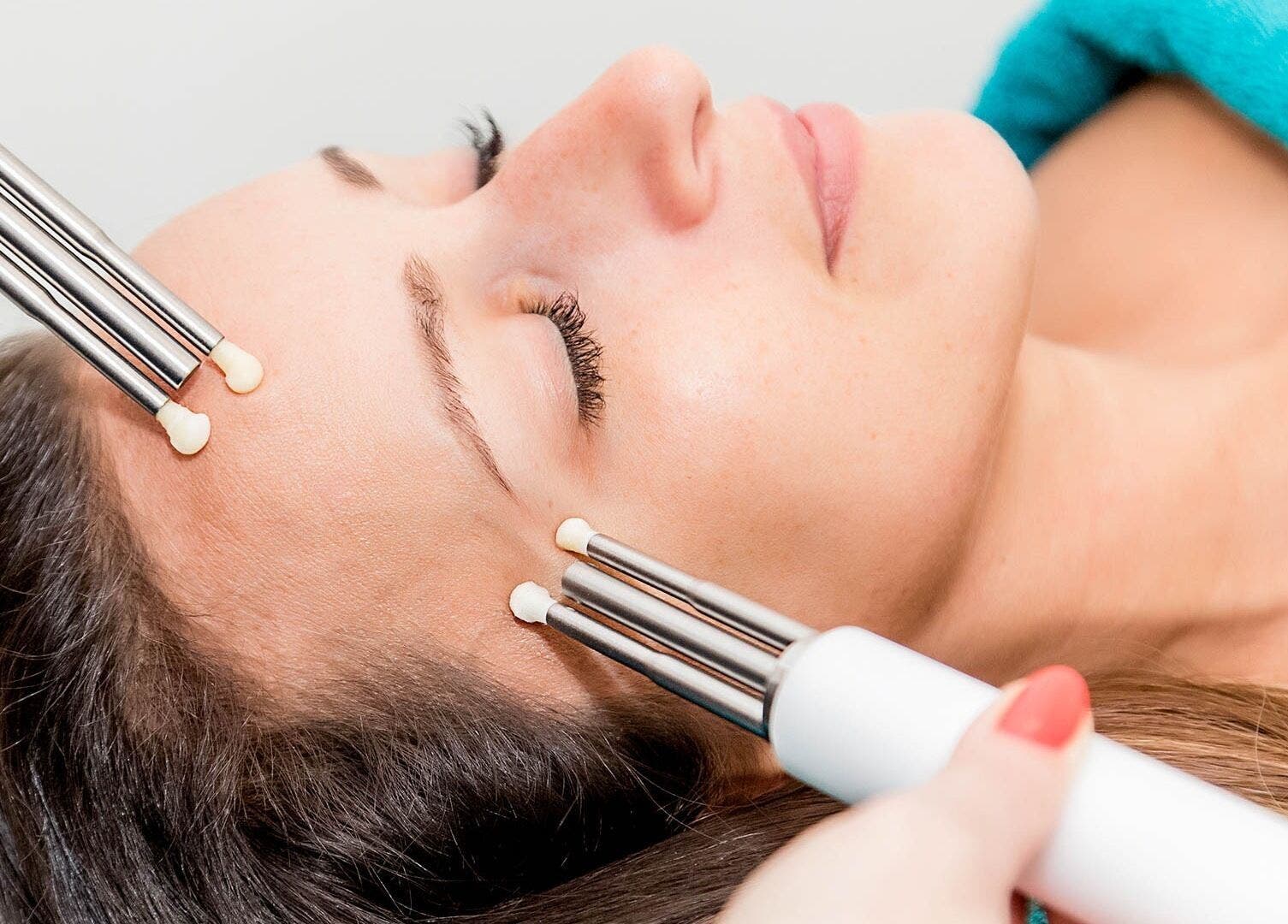 Relaxing facial treatment at Wellness Lounge, London, England, GB, featuring advanced skincare technology.