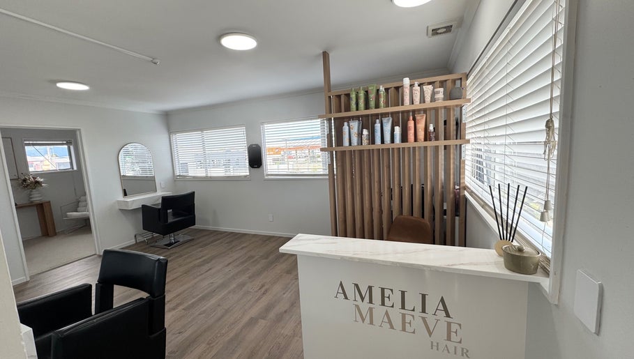 Inside view of Amelia Maeve Hair, Blenheim, Marlborough Region, NZ with chic decor and styling stations.