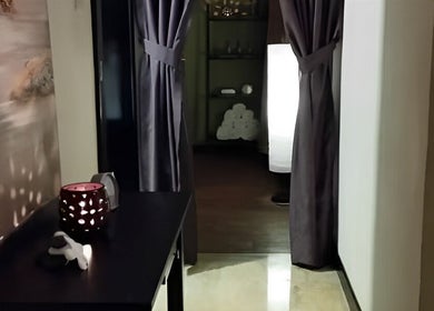 Cozy spa interior at Touch of Wellness Spa in Kota Kinabalu, Sabah, MY, with soft lighting and elegant decor.