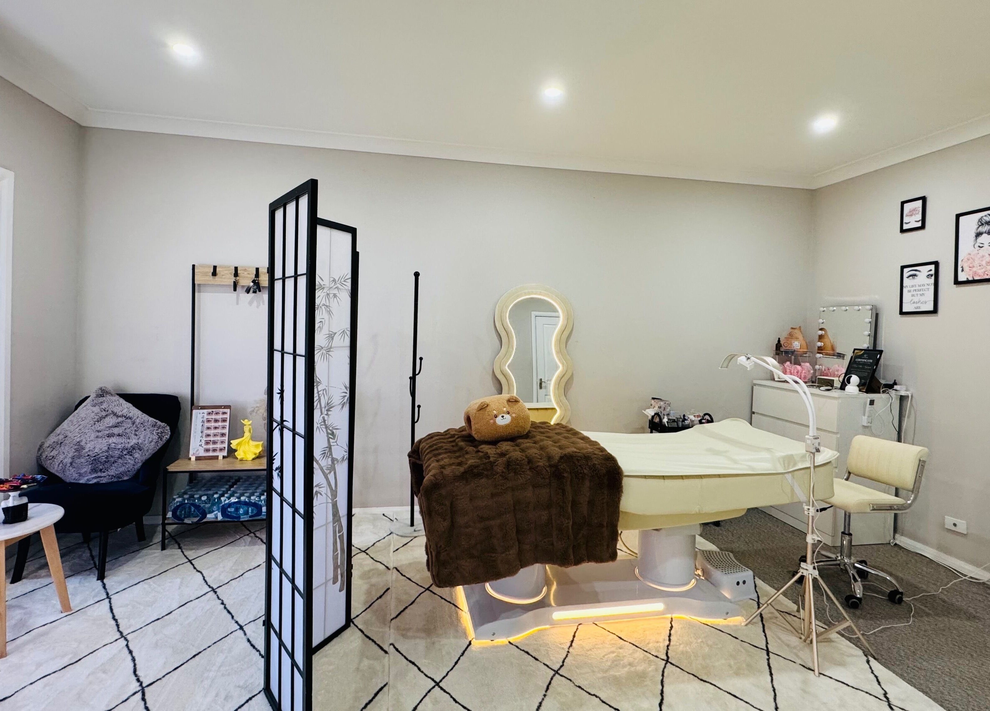 Relaxing beauty room at Moon Artistry Canley Vale, Canley Vale, New South Wales, AU with elegant decor and treatment bed.