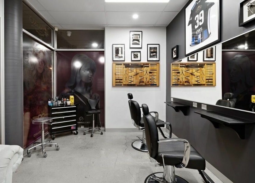 Modern styling chairs at Longko Salon, Mawson Lakes, South Australia, AU with elegant wall art.