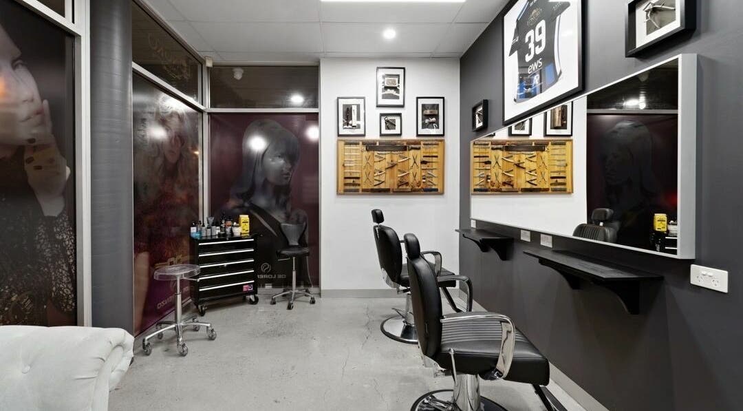 Modern styling chairs at Longko Salon, Mawson Lakes, South Australia, AU with elegant wall art.