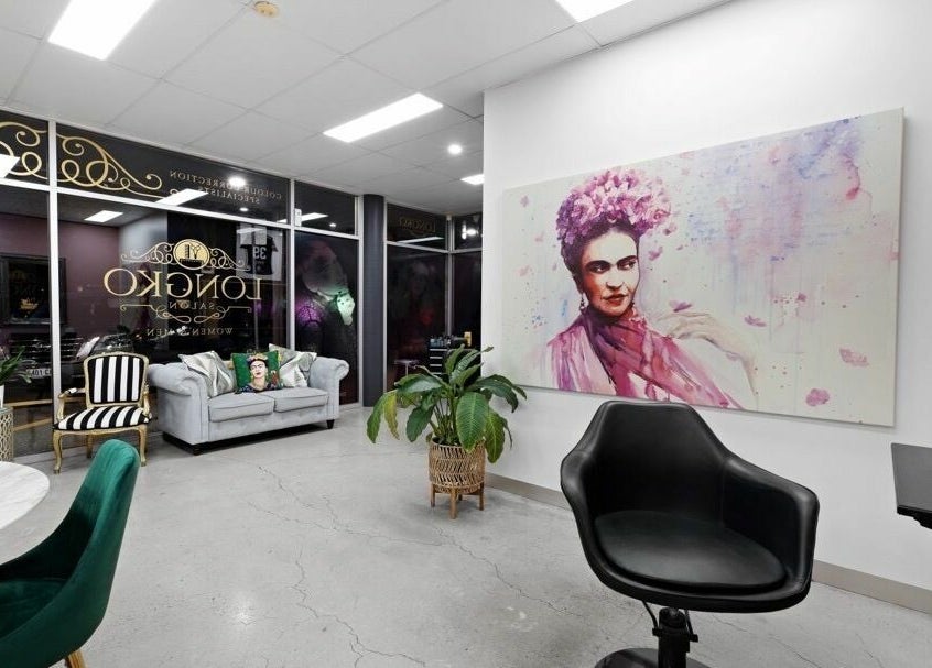 Stylish interior of Longko Salon, Mawson Lakes, South Australia, featuring chic furniture and art.