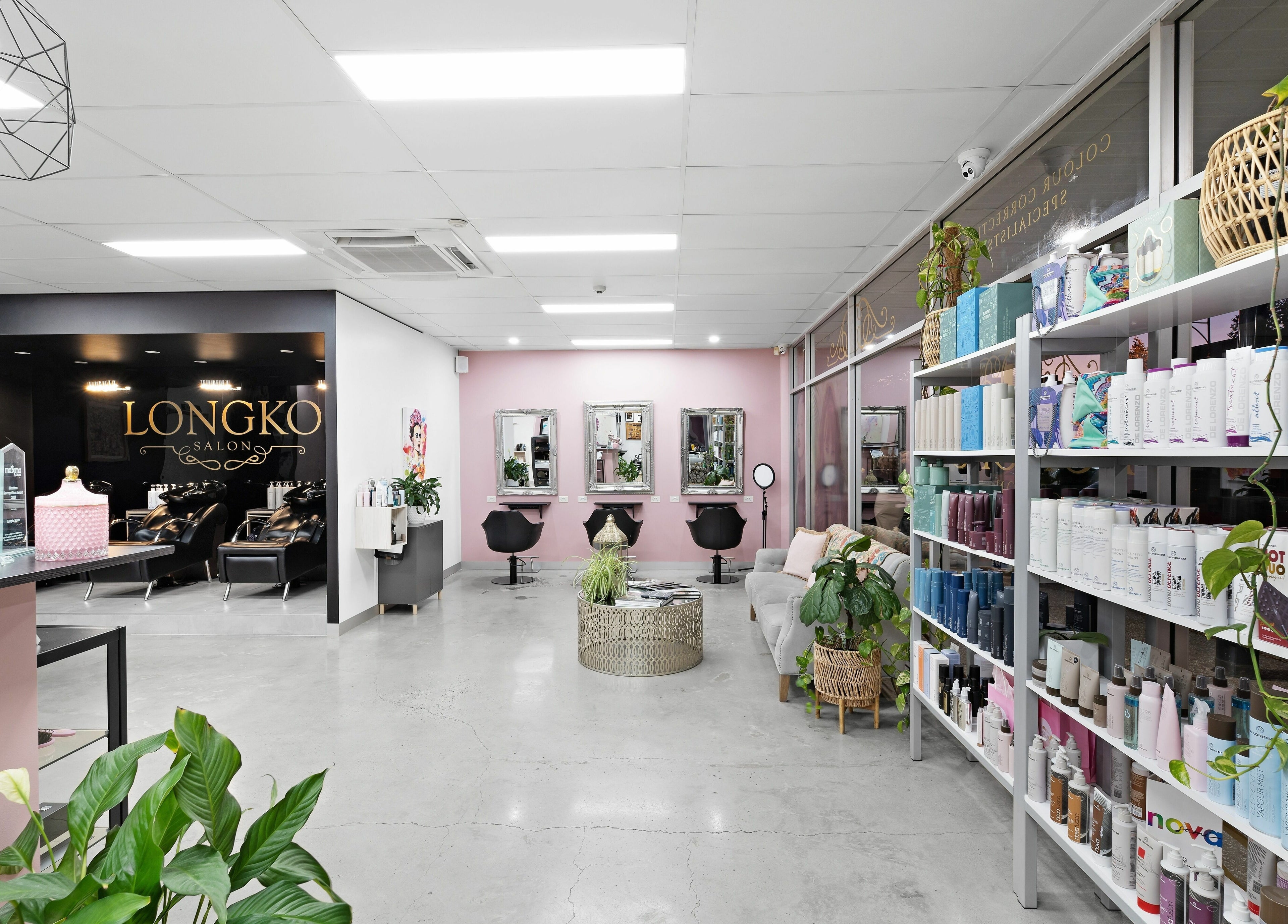 Modern interior of Longko Salon in Mawson Lakes, South Australia, showcasing elegant design and beauty products.
