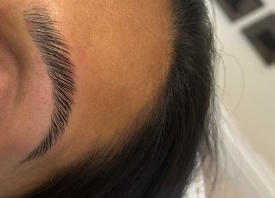 Close-up of well-groomed brows at Marble Beauty Bar, Glasgow, Scotland, GB. Expert eyebrow shaping services.