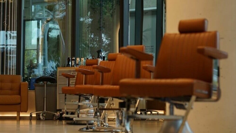 Luxurious hair salon chairs at Stallion, Maroochydore, QLD, AU showcasing modern decor.