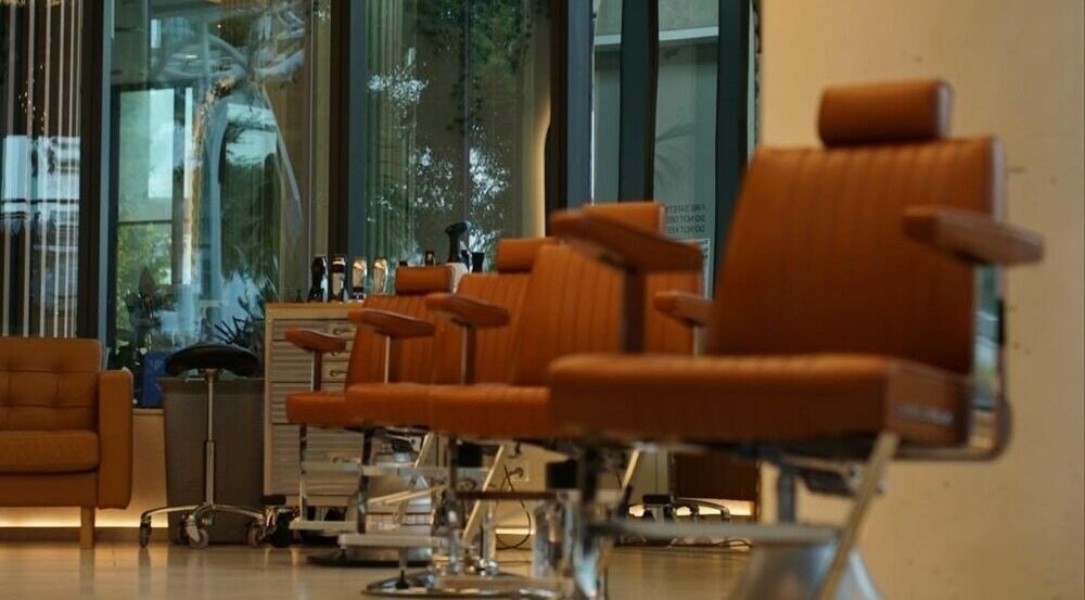 Luxurious hair salon chairs at Stallion, Maroochydore, QLD, AU showcasing modern decor.