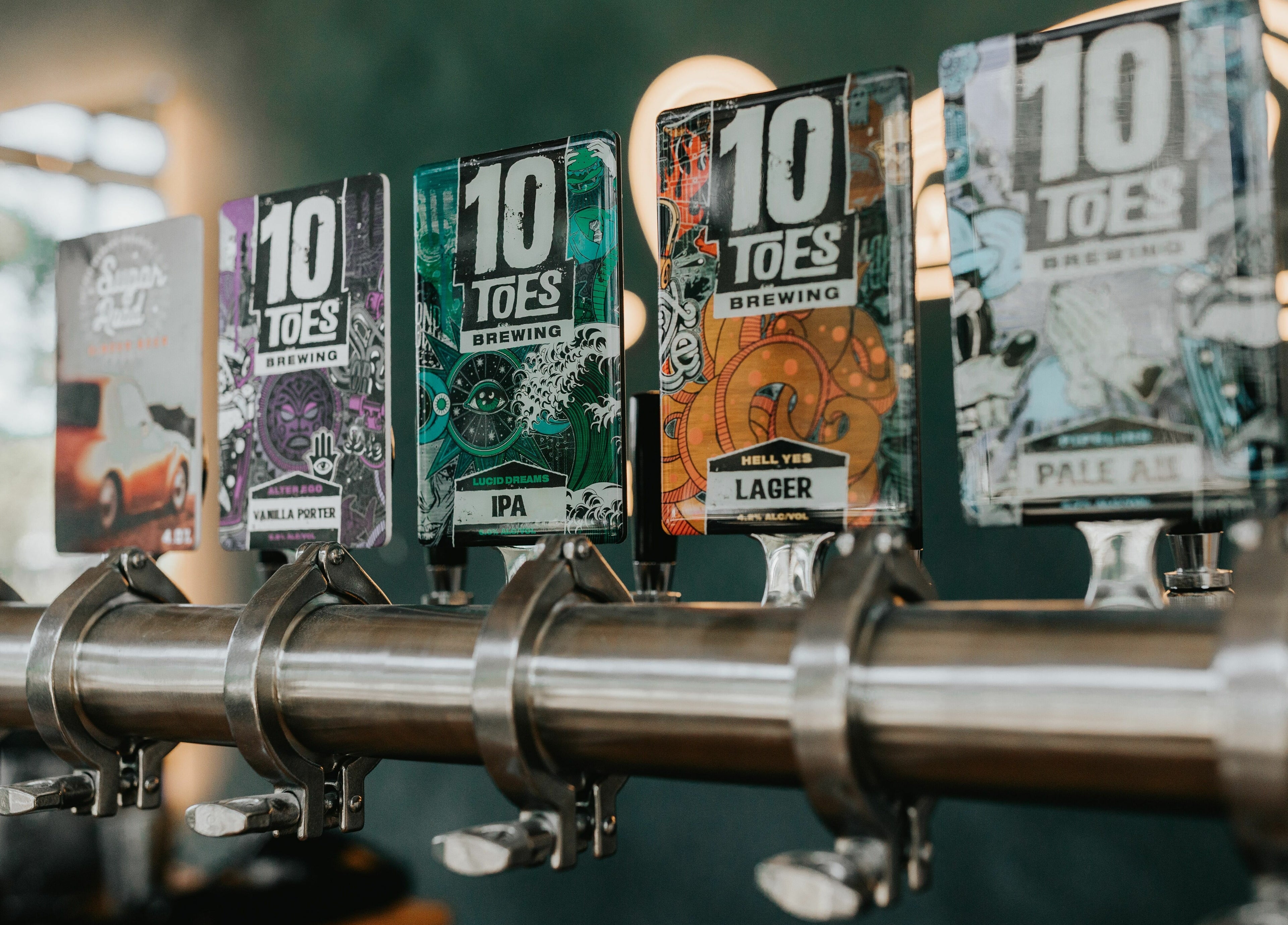 Craft beer taps at Stallion, Maroochydore, QLD, AU showcasing a variety of brews.