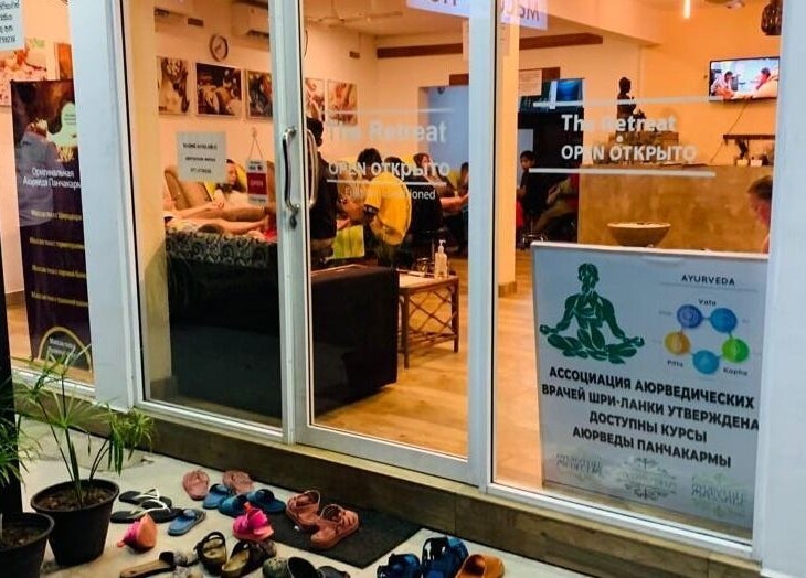 The Retreat in Hikkaduwa, Southern Province, LK, warmly lit entrance showcasing wellness services.