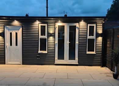 The Cosmetic Lodge at dusk in Hull, England, GB. Elegant facade with modern lighting and entrance.