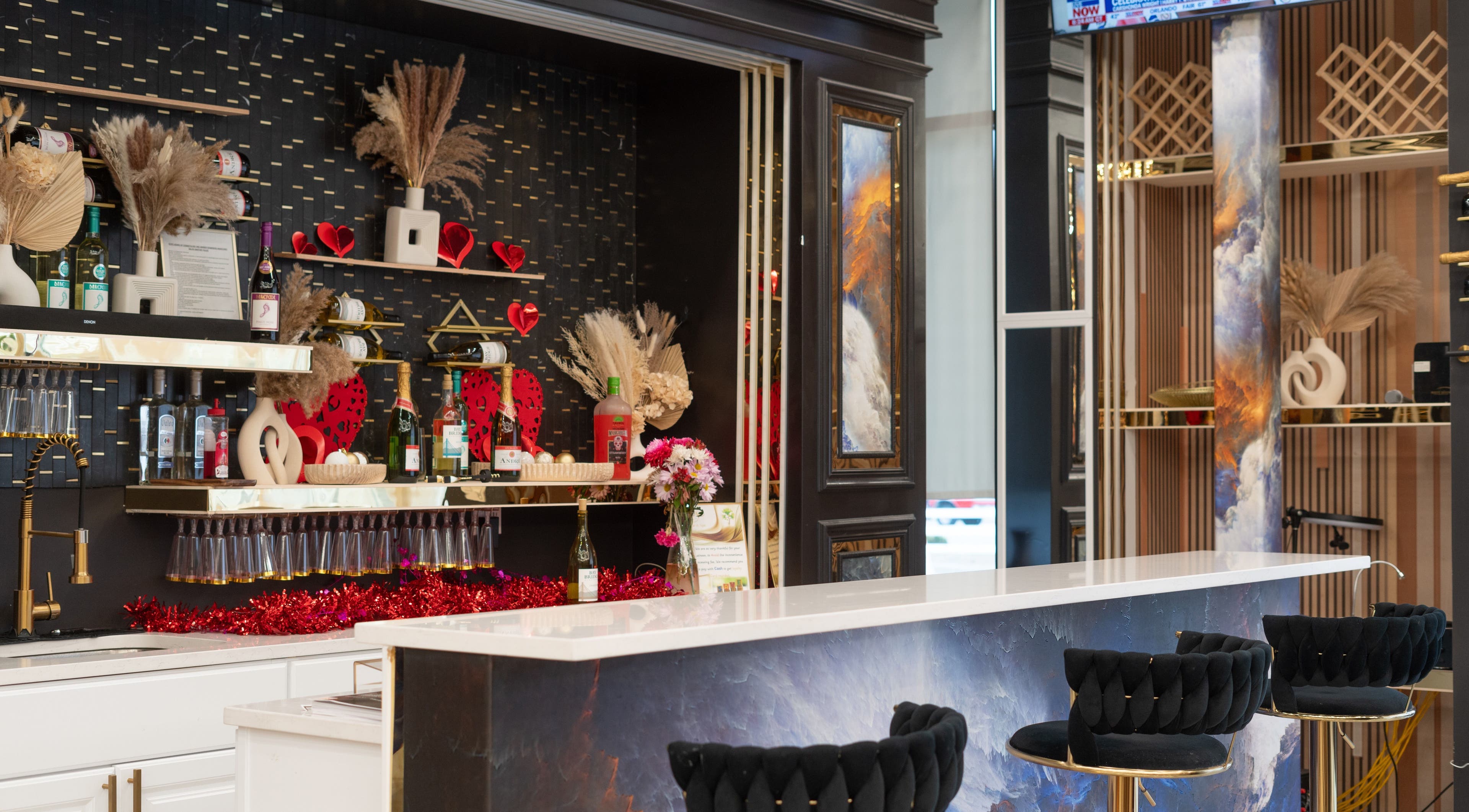 Elegant bar area at MV Nail Bar and Spa, Jeffersonville, Indiana, US with chic decor and stylish seating.