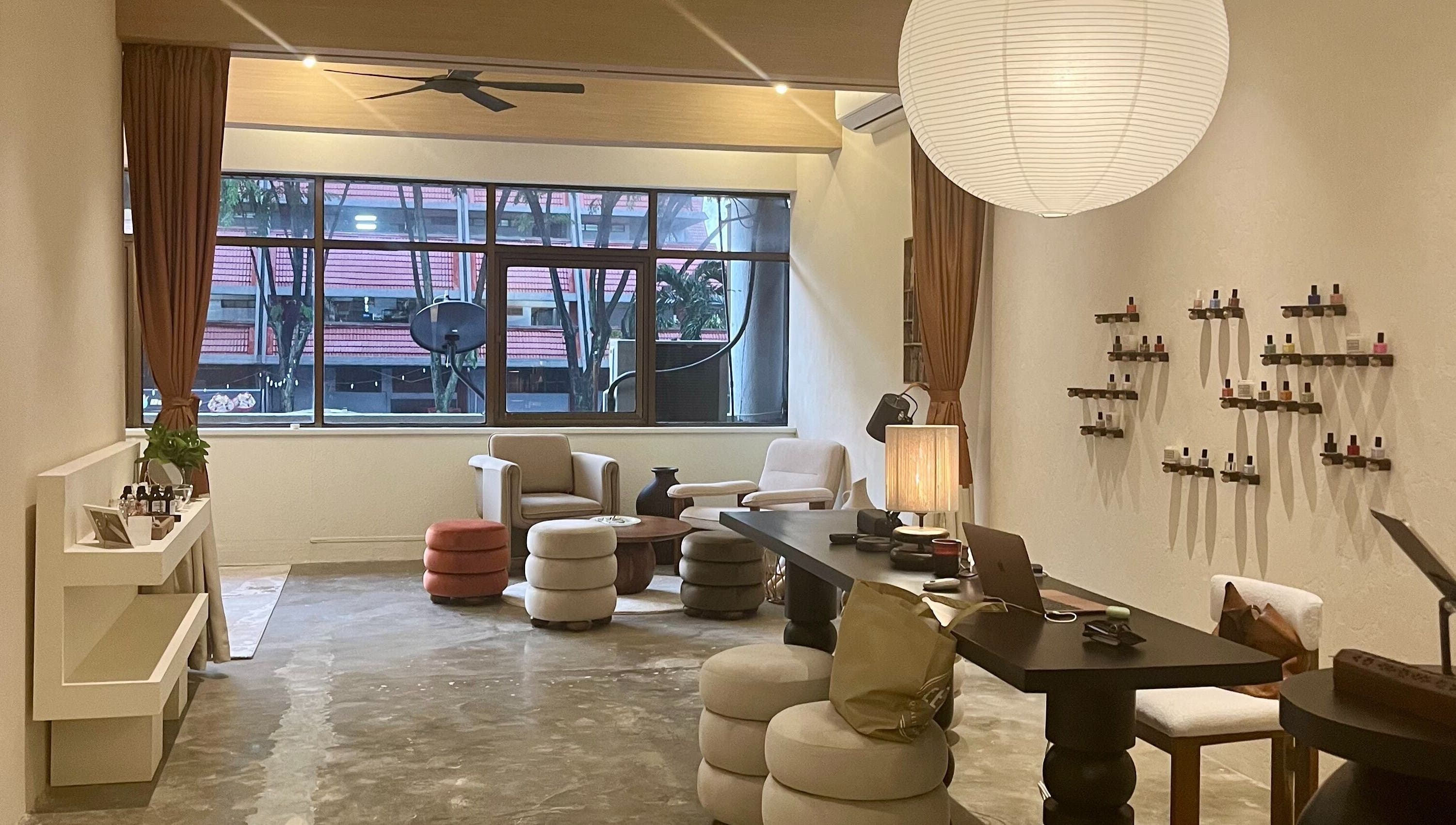 A cozy lounge at Honest Hour KL with modern decor in Kuala Lumpur, Wilayah Persekutuan Kuala Lumpur, MY.