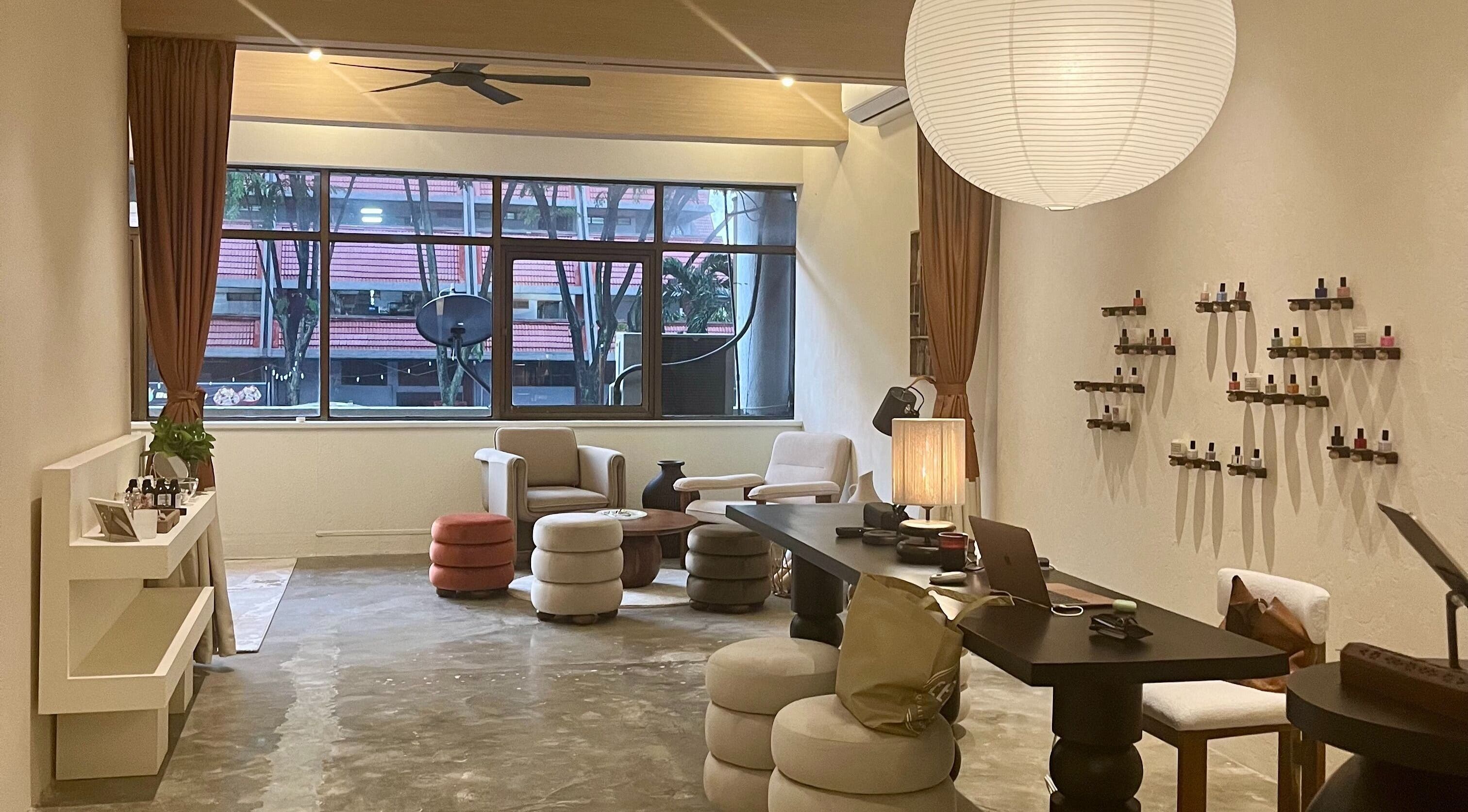 A cozy lounge at Honest Hour KL with modern decor in Kuala Lumpur, Wilayah Persekutuan Kuala Lumpur, MY.