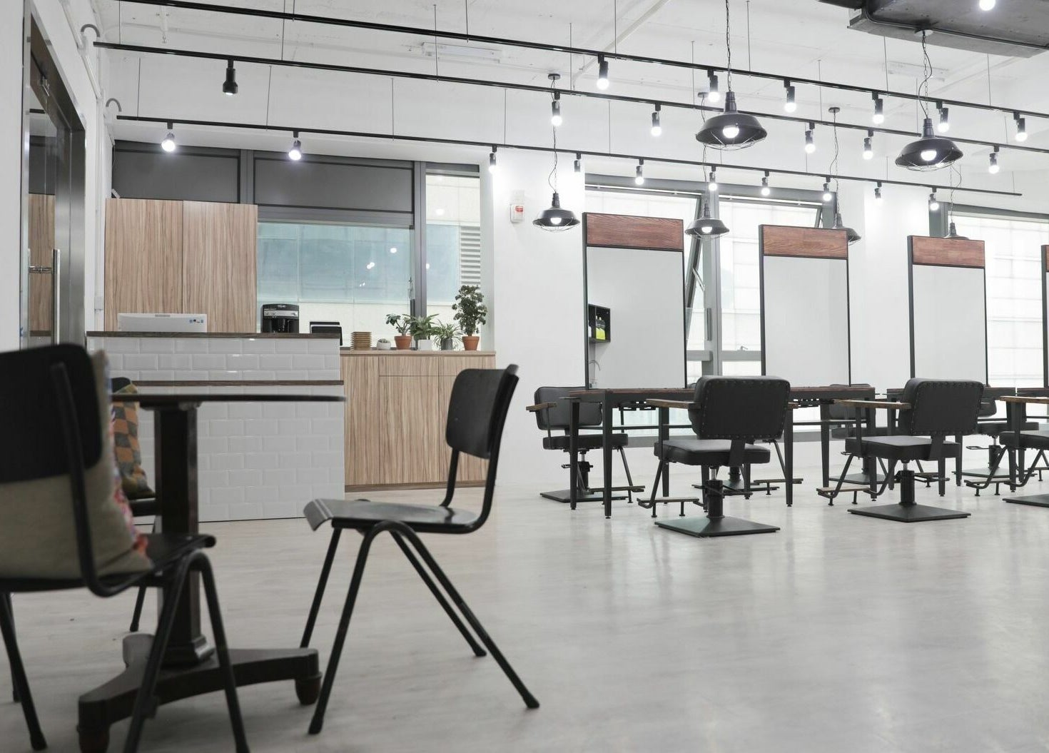 Modern salon setup at ASSORT HONG KONG on Hong Kong Island, Hong Kong Island, HK, featuring stylish seating.