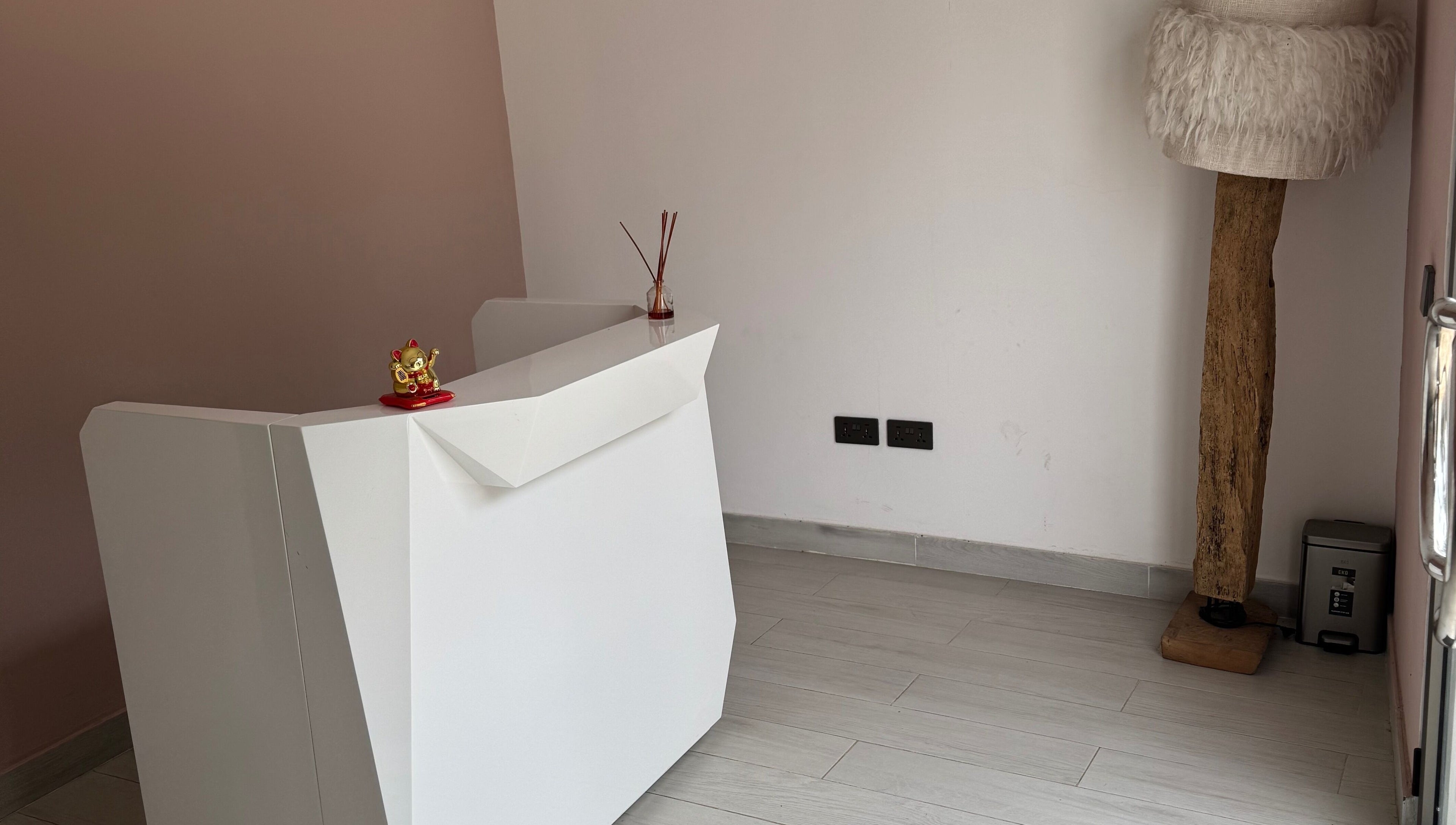 Reception desk at The Wax Lounge Mauritius, Port Louis, Port Louis District, MU with elegant decor.