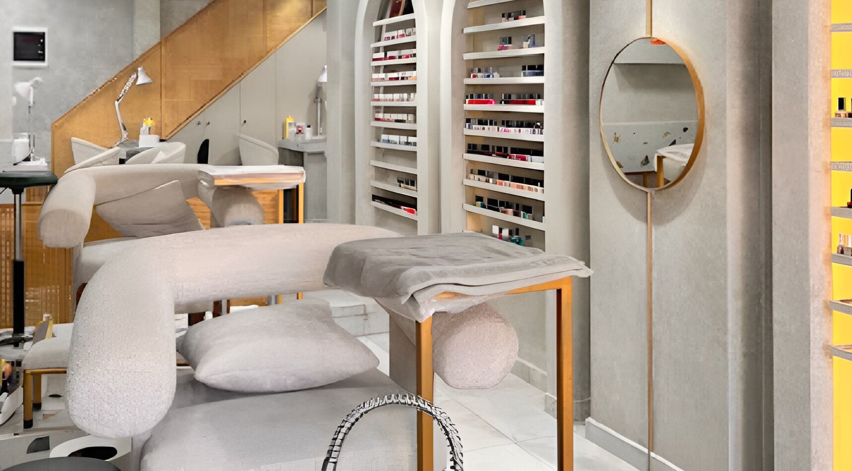 Elegant nail bar interior at Léa HD Beauty Concept, Tripoli, North Governorate, LB, featuring plush seating.