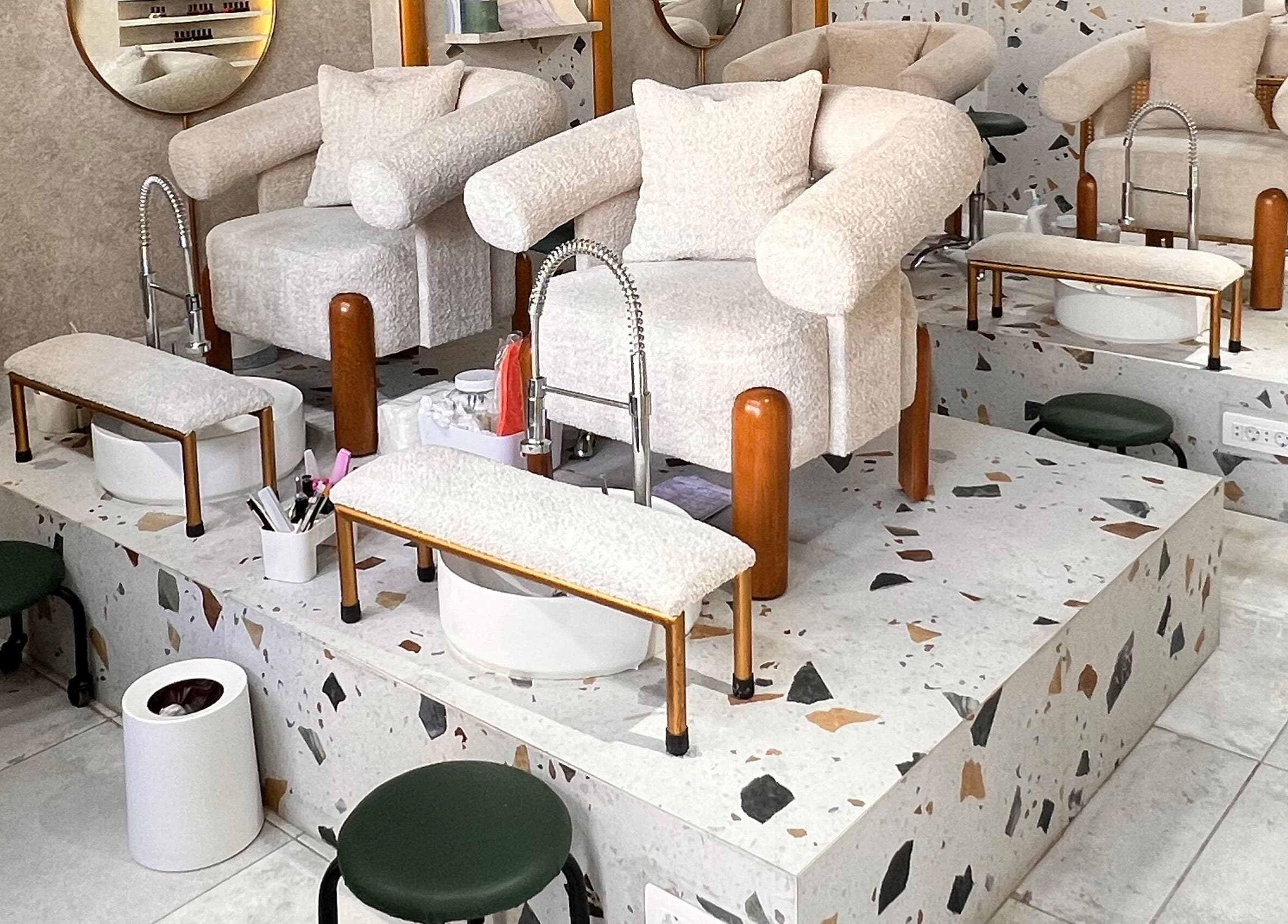 Luxurious pedicure chairs at Léa HD Beauty Concept in Tripoli, North Governorate, LB offer modern elegance and comfort.