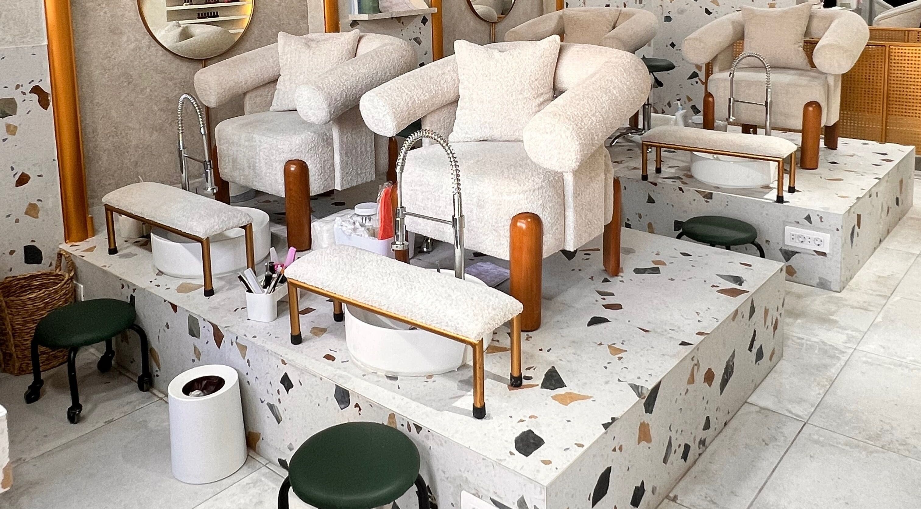 Luxurious pedicure chairs at Léa HD Beauty Concept in Tripoli, North Governorate, LB offer modern elegance and comfort.