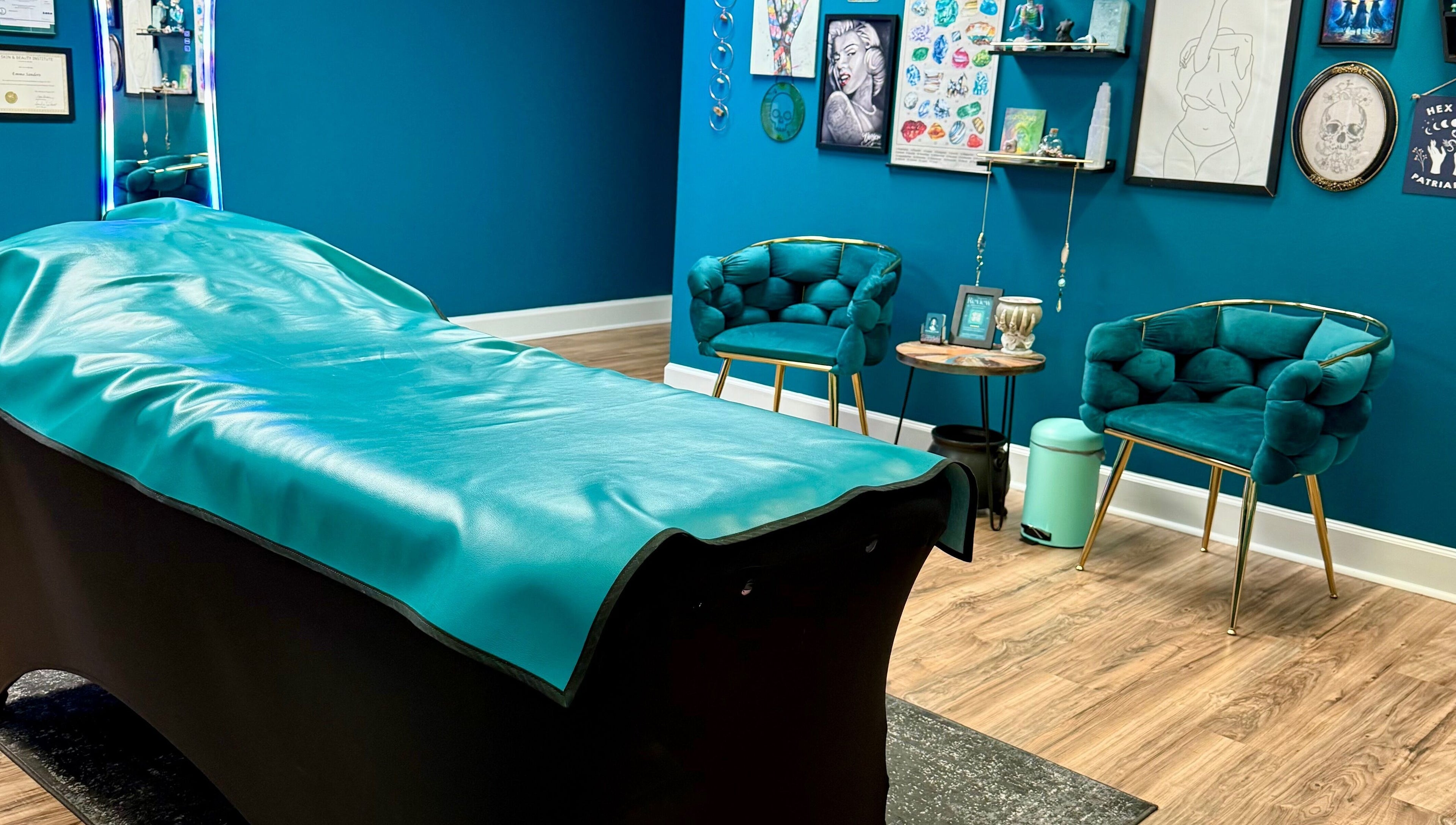 Relaxing wax room at Crystal Coven Waxing in Alexandria, Virginia, US, with teal tones and cozy seating.