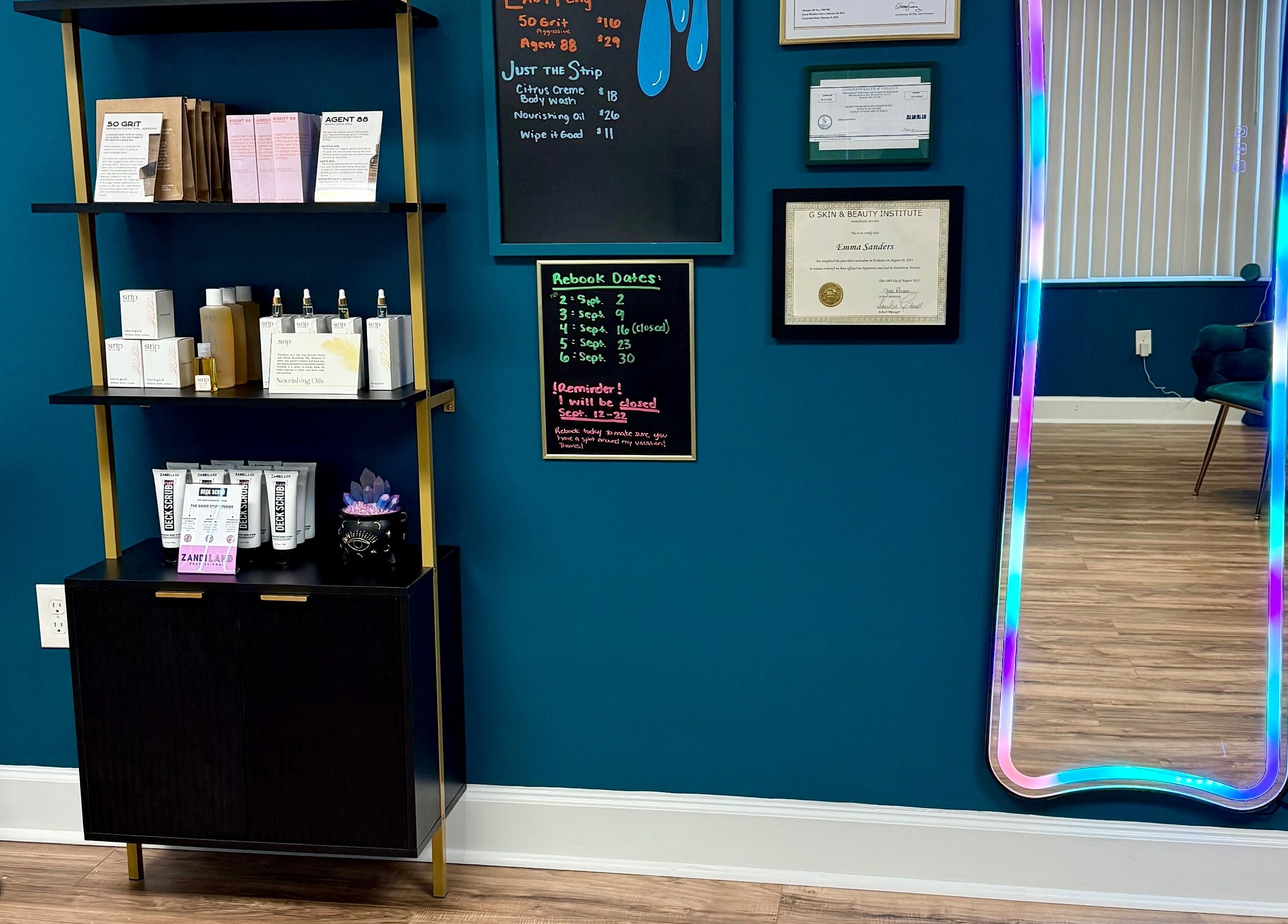 Product shelf and colorful mirror at Crystal Coven Waxing, Alexandria, Virginia, US.