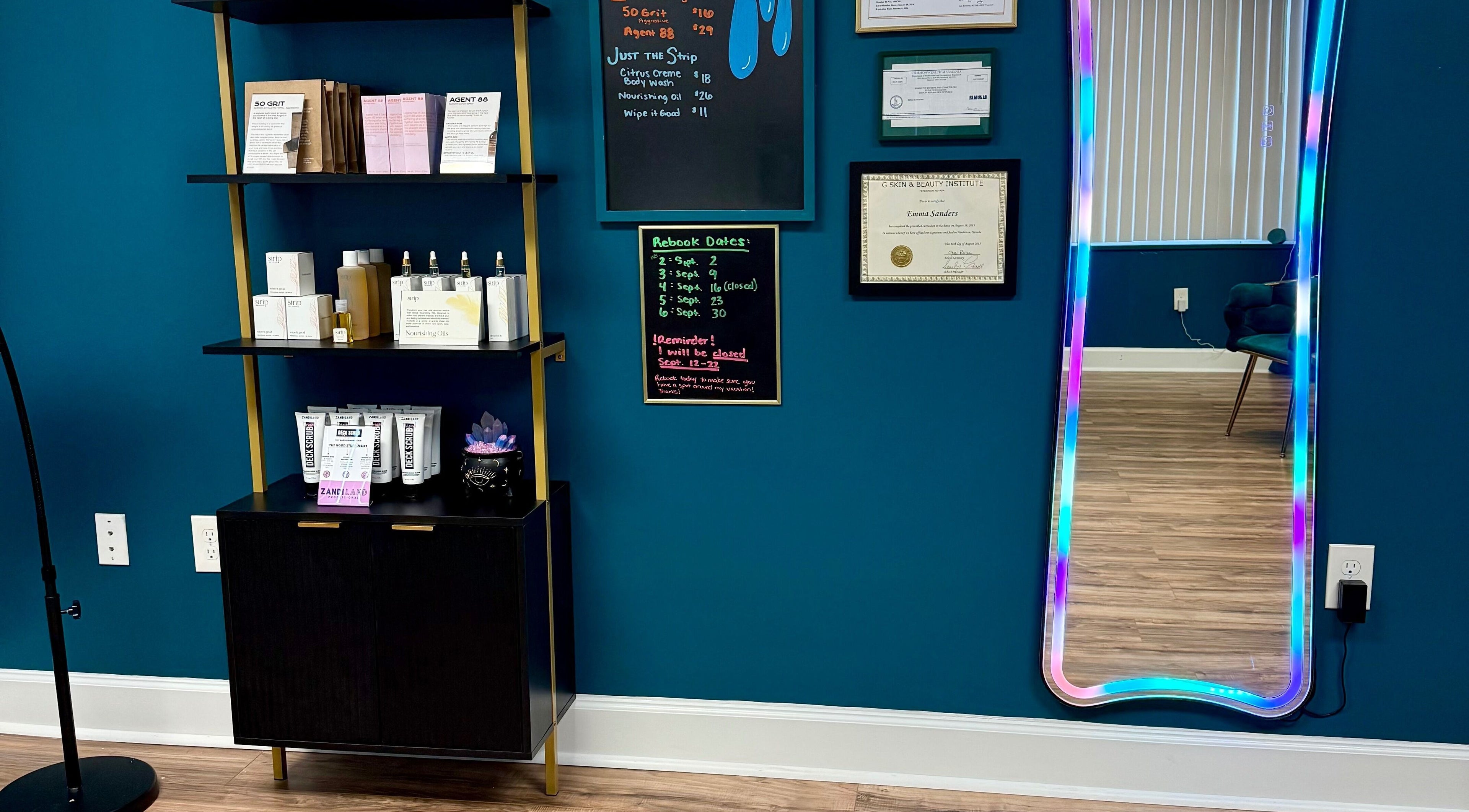 Product shelf and colorful mirror at Crystal Coven Waxing, Alexandria, Virginia, US.