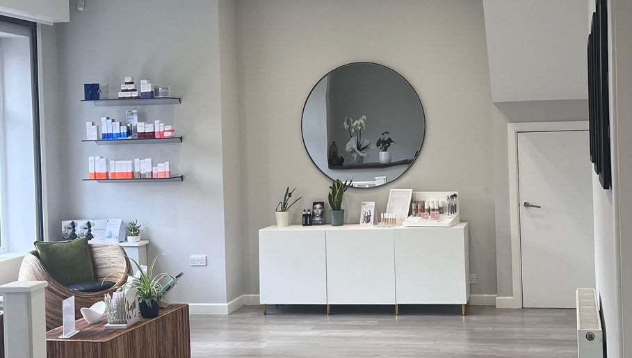 Modern waiting area at Skinergy by Leona, Manchester, England, GB with stylish decor and beauty products.