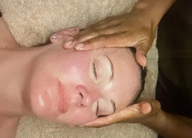 Relaxing facial massage at Skinergy by Leona, Manchester, England, GB, promotes rejuvenation and tranquility.