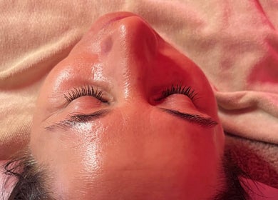 Relaxed face enjoying skincare treatment at Skinergy by Leona, Manchester, England, GB.