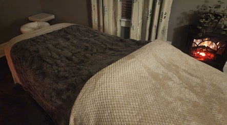 Massage table in a serene setting at Dexter Massage - Located in the Verapose Yoga House, Dexter, Michigan, US.