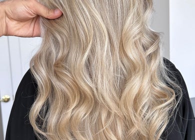 Blonde wavy hair styled at Beauty By Lid Hair Salon, Santa Clarita, California, US.