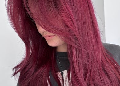 Stunning magenta hairstyle at Beauty By Lid Hair Salon in Santa Clarita, California, US.