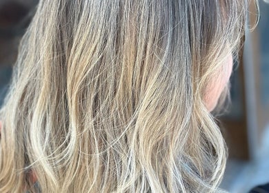 Beautiful blonde waves styled at Beauty By Lid Hair Salon in Santa Clarita, California, US.