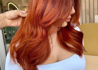 Vibrant red hairstyle at Beauty By Lid Hair Salon, Santa Clarita, California, US.