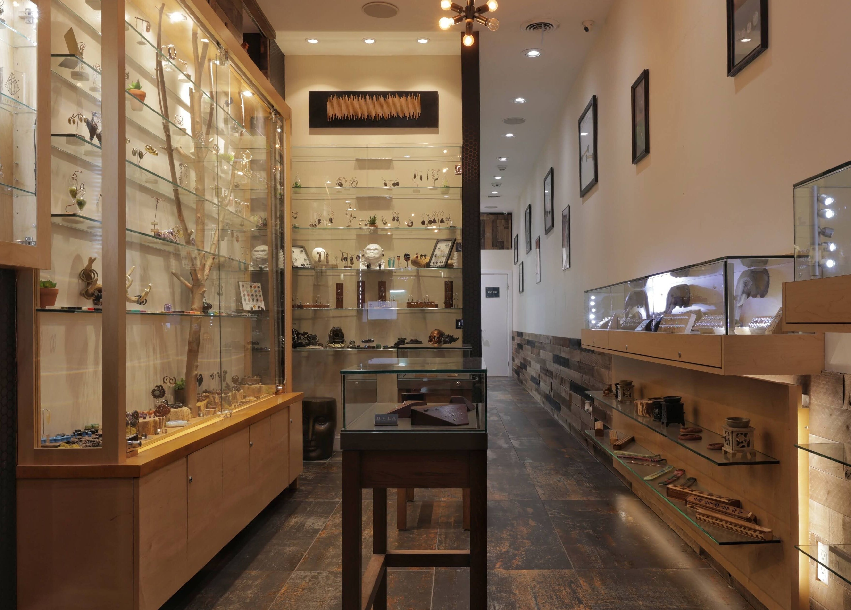 Inside True Expression Piercing Studio, showcasing elegant jewelry displays in New York, New York, US.