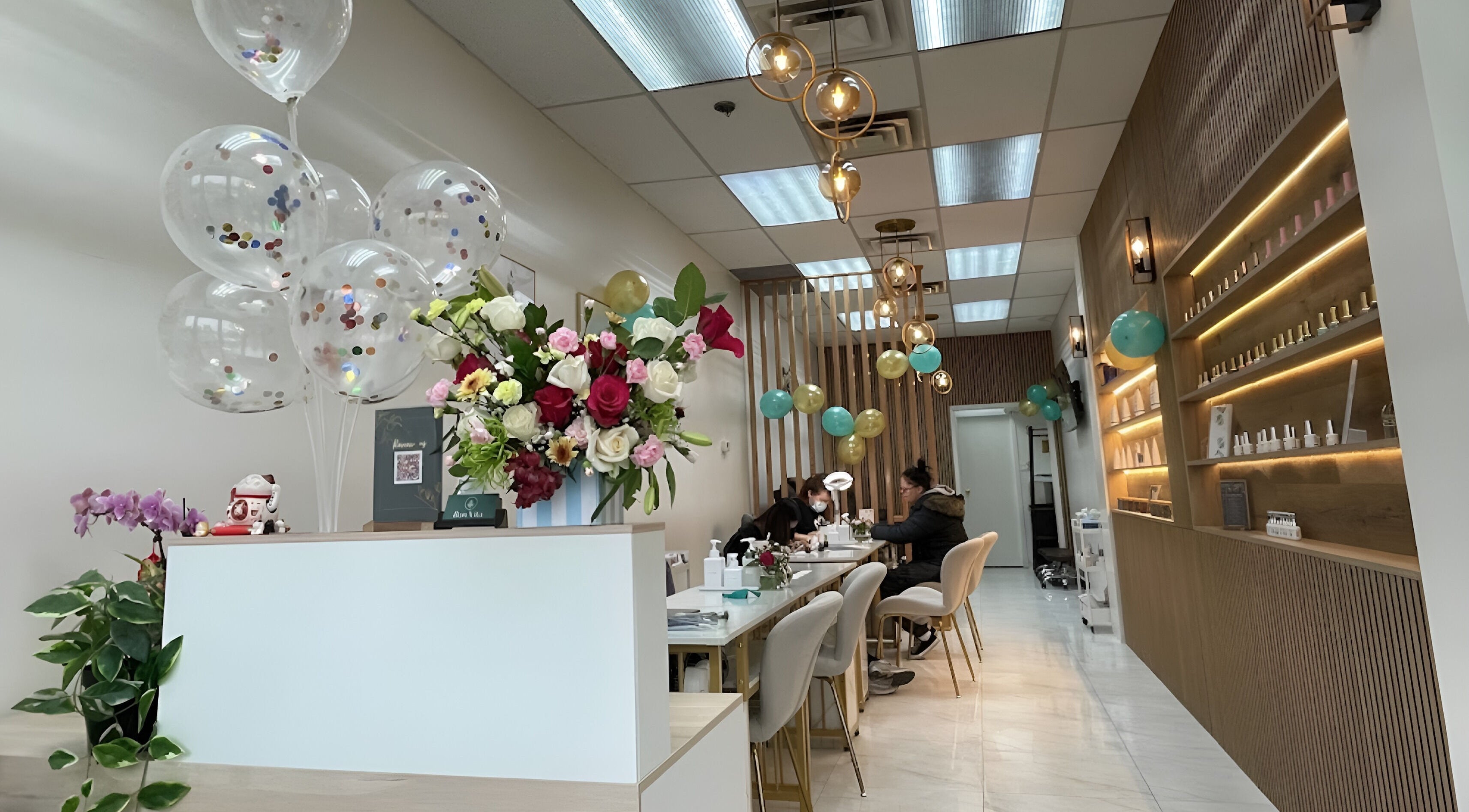 Elegant interior of Bon Vita Herbal Spa & Nails in Richmond Hill, Ontario, CA with floral decor and soft lighting.