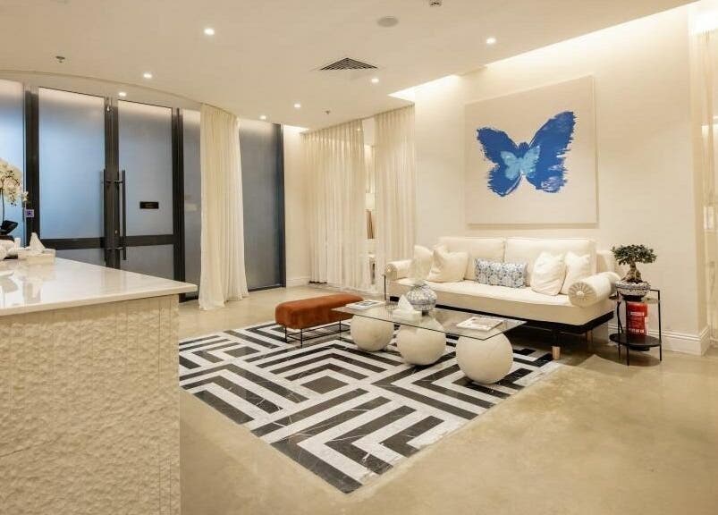 Elegant reception area of Aya Salon in Riyadh, Riyadh Province, SA with plush seating and artistic decor.