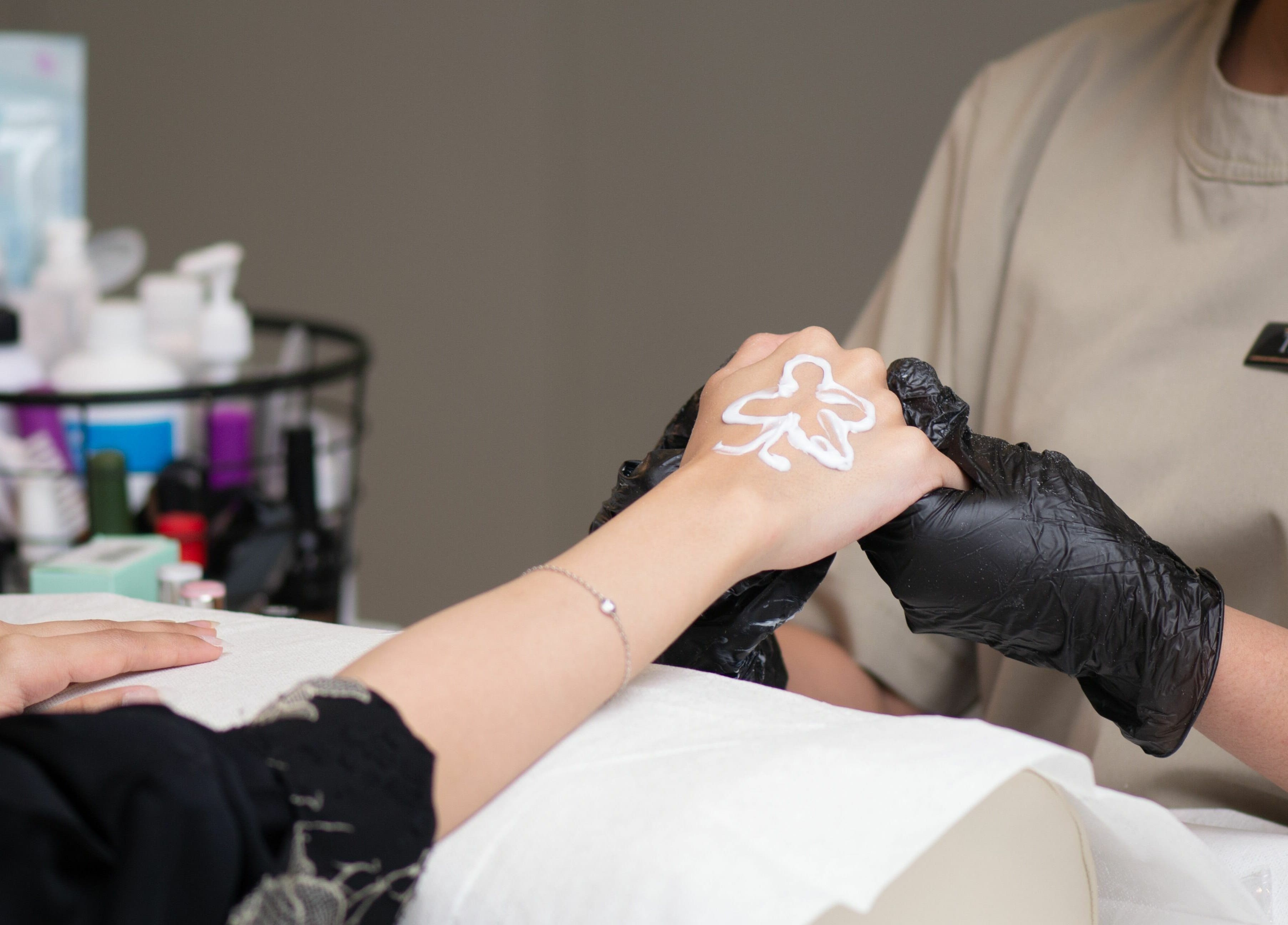 Aya Salon beauty treatment in Riyadh with intricate hand art in progress. Riyadh Province, SA.