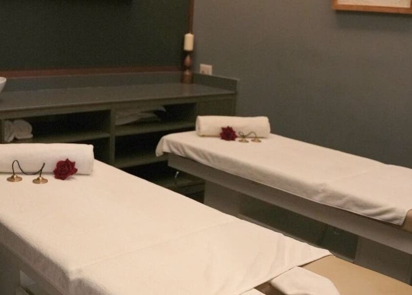 Relaxing massage room at DWS-Barcelo Al Jaddaf, Dubai, Dubai, AE, featuring two treatment tables with white linens.
