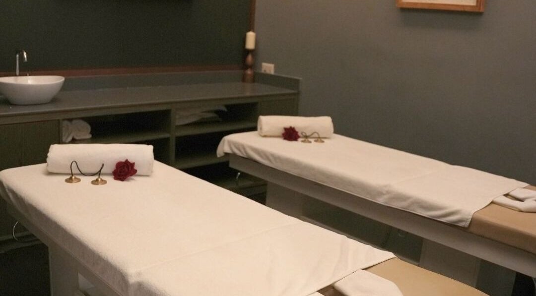 Relaxing massage room at DWS-Barcelo Al Jaddaf, Dubai, Dubai, AE, featuring two treatment tables with white linens.