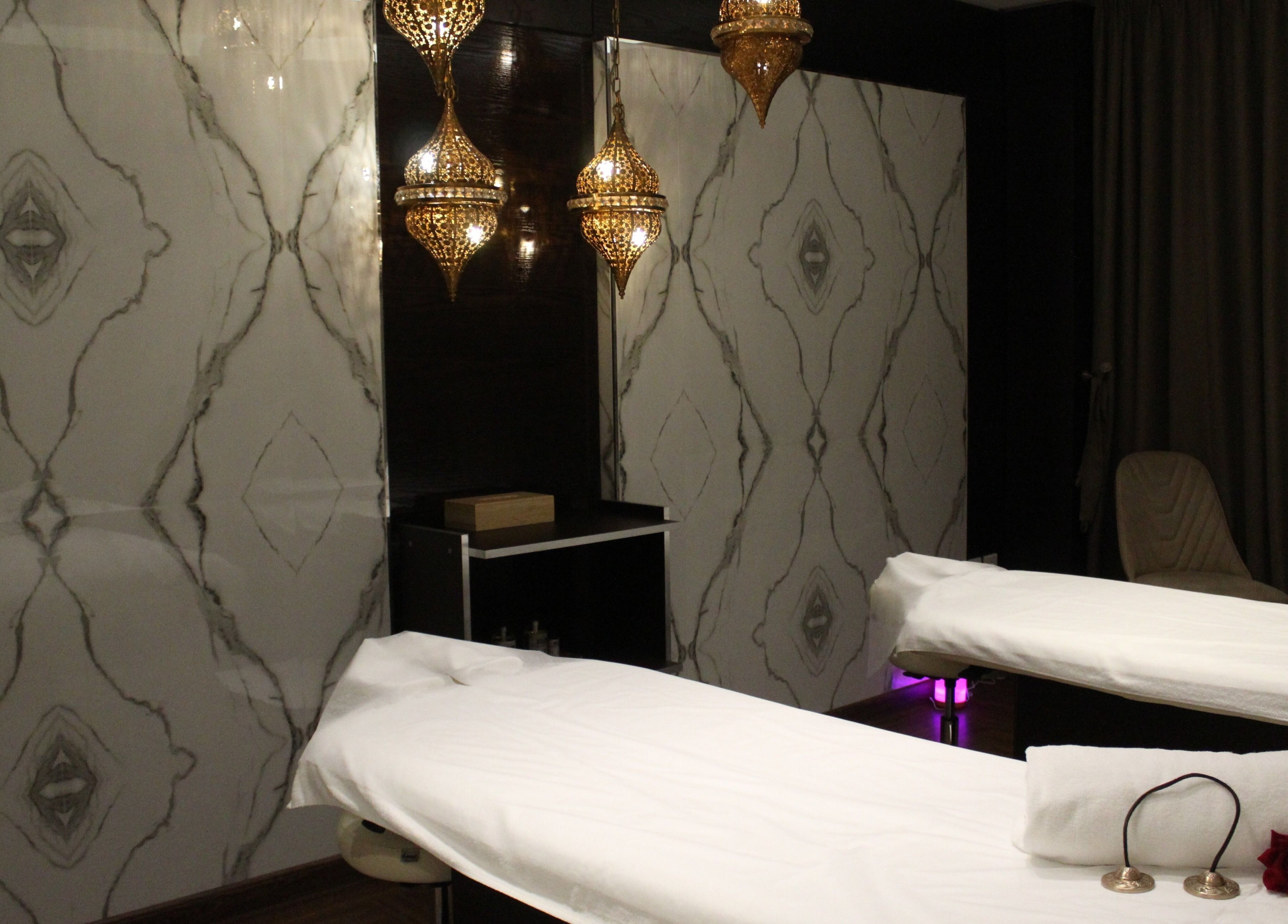 Elegant massage room at DWS-Barcelo Al Jaddaf, Dubai, Dubai, AE, featuring ornate decor and warm lighting.