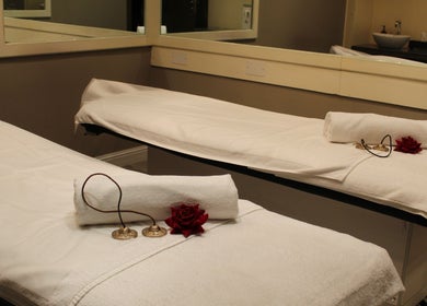 Relaxing spa room at DWS-Marina Cascades, Dubai, Dubai, AE, featuring plush treatment beds.