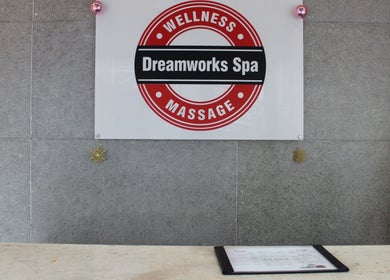 Front desk with Dreamworks Spa sign at DWS-Marina Cascades, Dubai, Dubai, AE, featuring wellness decor.
